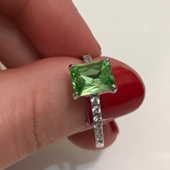 silver ring with green stone